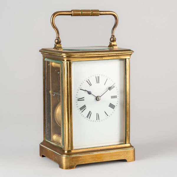 A FRENCH BRASS STRIKING CARRIAGE CLOCK