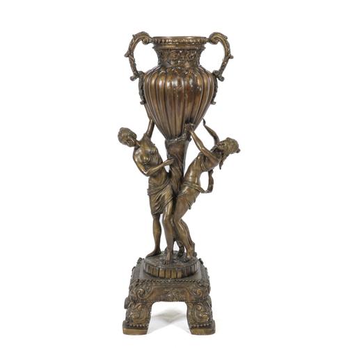 A BRONZE PATINATED METAL FLOOR STANDING JARDINIERE OR URN