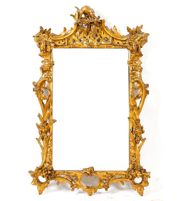 AN UNUSUAL GEORGE III GILT FRAMED WALL MIRROR