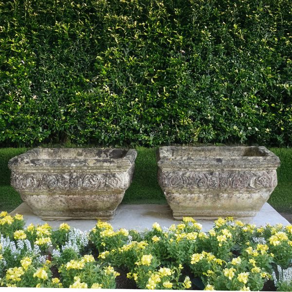 A PAIR OF RECONSTITUTED STONE SQUARE PLANTERS
