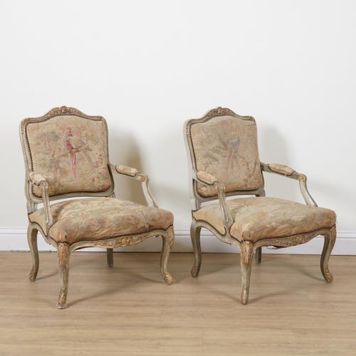 A PAIR OF LOUIS XV STYLE GREY PAINTED PARCEL GILT DECORATED OPEN ARMCHAIRS (2)