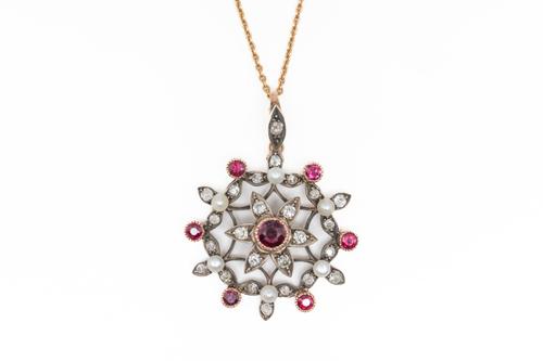 A RUBY, DIAMOND AND CULTURED PEARL PENDANT NECKLACE