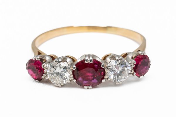 A RUBY AND DIAMOND FIVE STONE RING