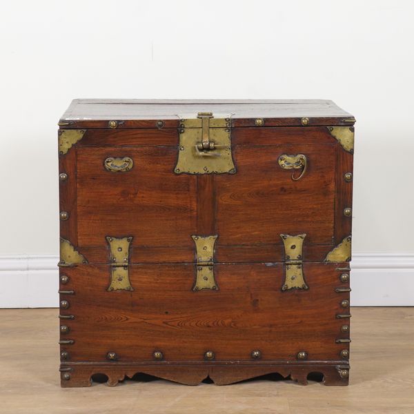 AN EARLY 20TH CENTURY INDIAN BRASS BOUND HARDWOOD CUPBOARD