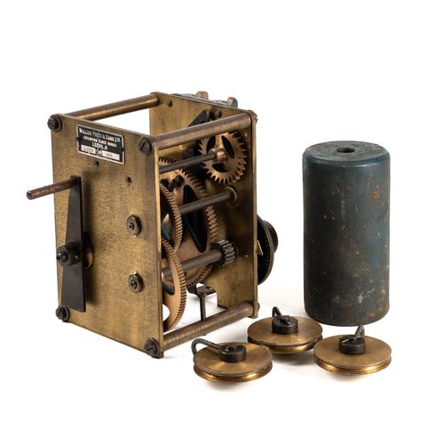 A SMALL BRASS TURRET CLOCK MOVEMENT