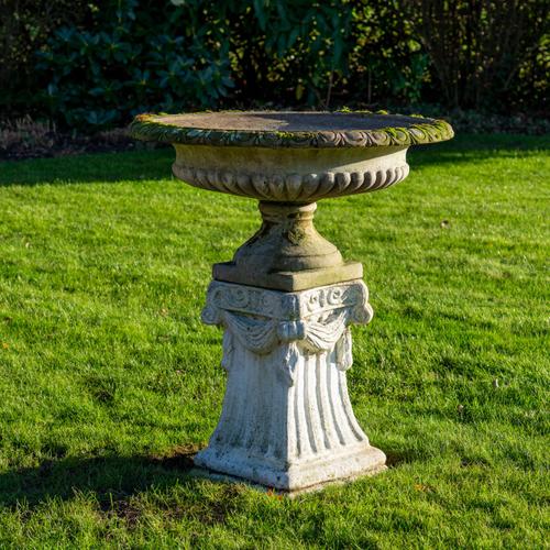 A PAIR OF RECONSTITUTED STONE SHALLOW JARDINIERES