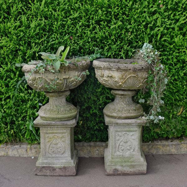 A PAIR OF RECONSTITUTED STONE JARDINIERES (2)