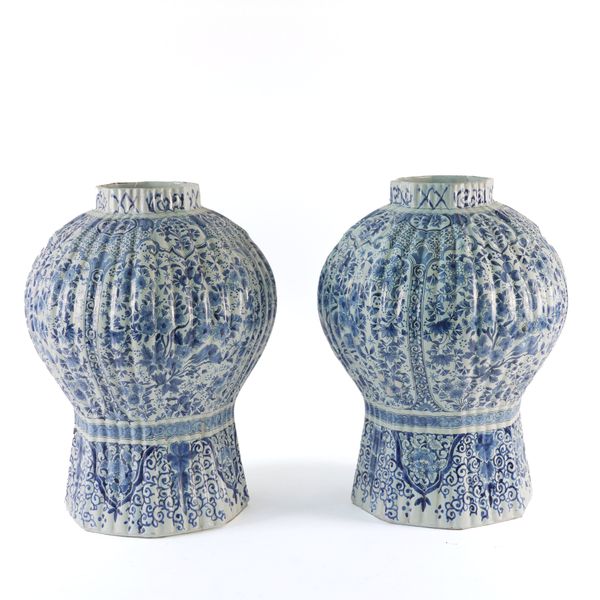 A PAIR OF LARGE DUTCH DELFT RIBBED BALUSTER VASES (2)