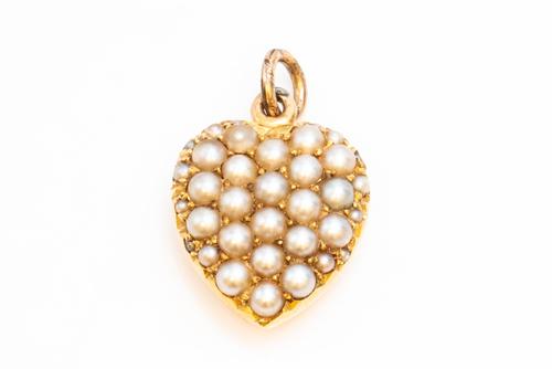 A GOLD AND SEED PEARL HEART SHAPED PENDANT