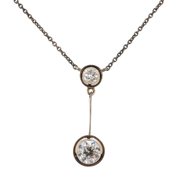 A TWO STONE DIAMOND DROP PENDANT
