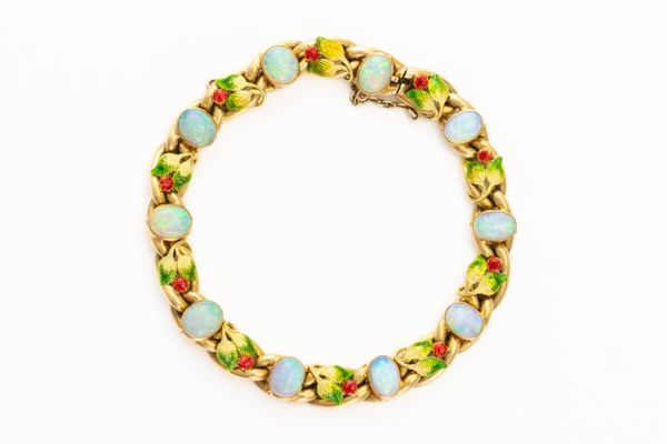 ATTRIBUTED TO MRS NEWMAN: A GOLD, OPAL AND ENAMEL BRACELET