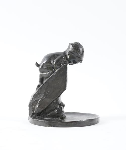 A PATINATED BRONZE DISH MODELLED WITH A CROUCHING BABY FAUN