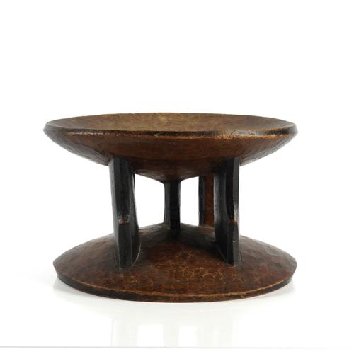 AN AFRICAN HARDWOOD STOOL