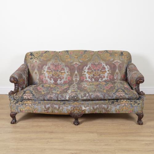 A GEORGE II STYLE WALNUT FRAMED TRIPLE HUMP BACK SOFA