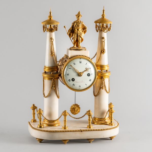 A LATE LOUIS XVI ORMOLU-MOUNTED MANTEL CLOCK