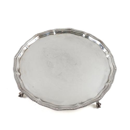 A SILVER SHAPED CIRCULAR SALVER