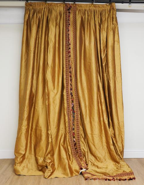 TWO YELLOW GOLD AND TASSEL CURTAINS (2)