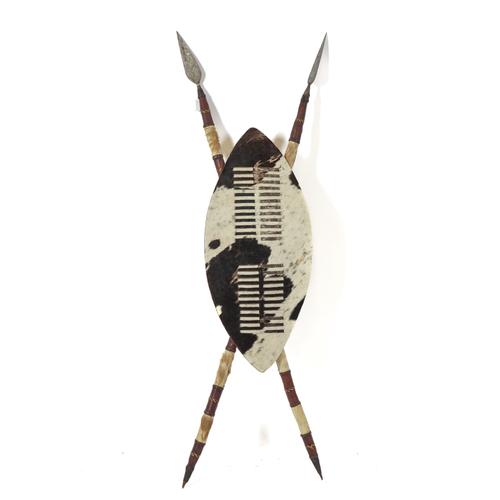 AN AFRICAN COW HIDE TRIBAL SHIELD AND SPEAR WALL HANGING DISPLAY