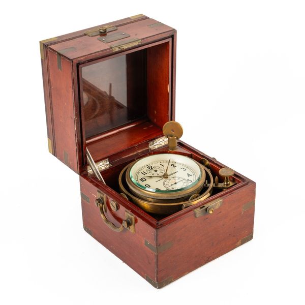 A RUSSIAN BRASS-MOUNTED MAHOGANY SHIP’S CHRONOMETER