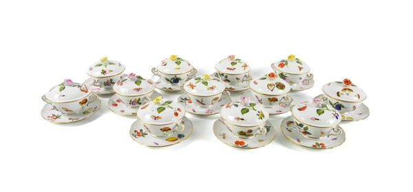 A SET OF TWELVE HEREND `MARKET GARDEN' PATTERN OZIER MOULDED SOUP CUPS, COVERS AND STANDS (36)