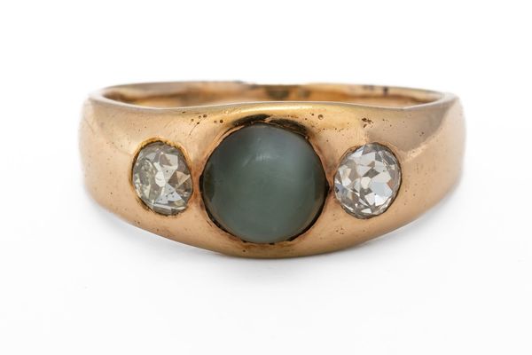 A CAT'S EYE CHRYSOBERYL AND DIAMOND RING