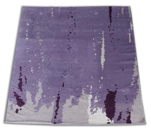 A MODERN PURPLE ABSTRACT CARPET