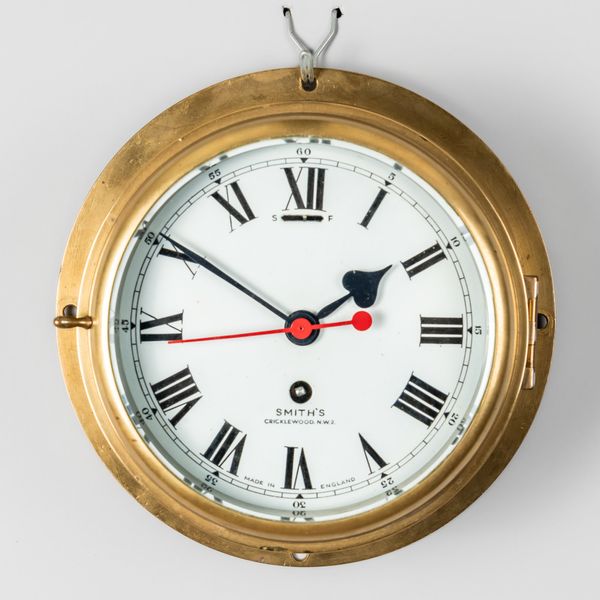 A BRASS BULKHEAD TIMEPIECE