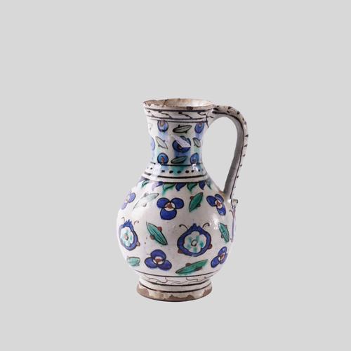 AN IZNIK POTTERY JUG, OTTOMAN ANATOLIA