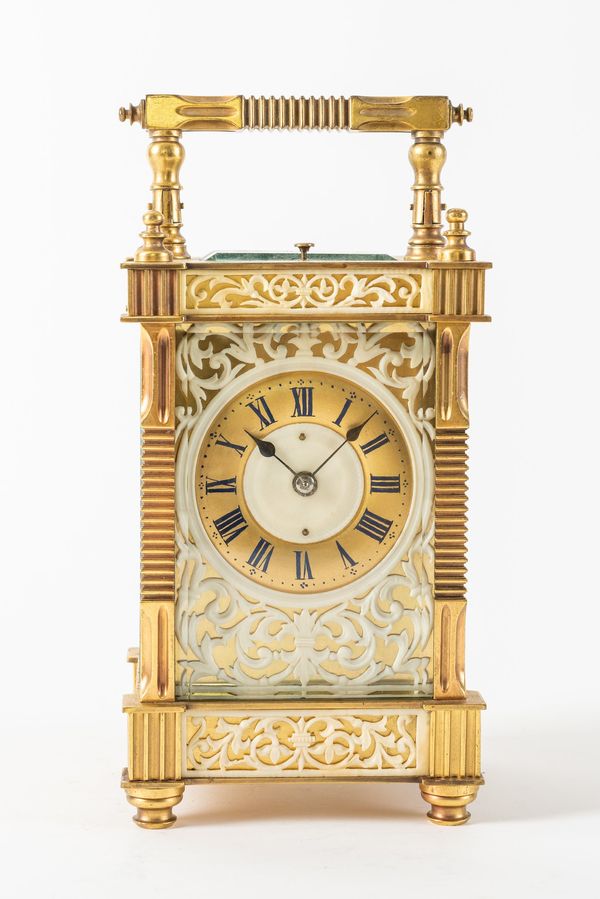 A FRENCH GILT BRASS, IVORY MOUNTED, STRIKING AND REPEATING CARRIAGE CLOCK