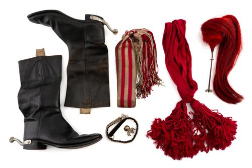 A GROUP OF BRITISH MILITARY UNIFORM AND CAVALRY ACCOUTREMENTS