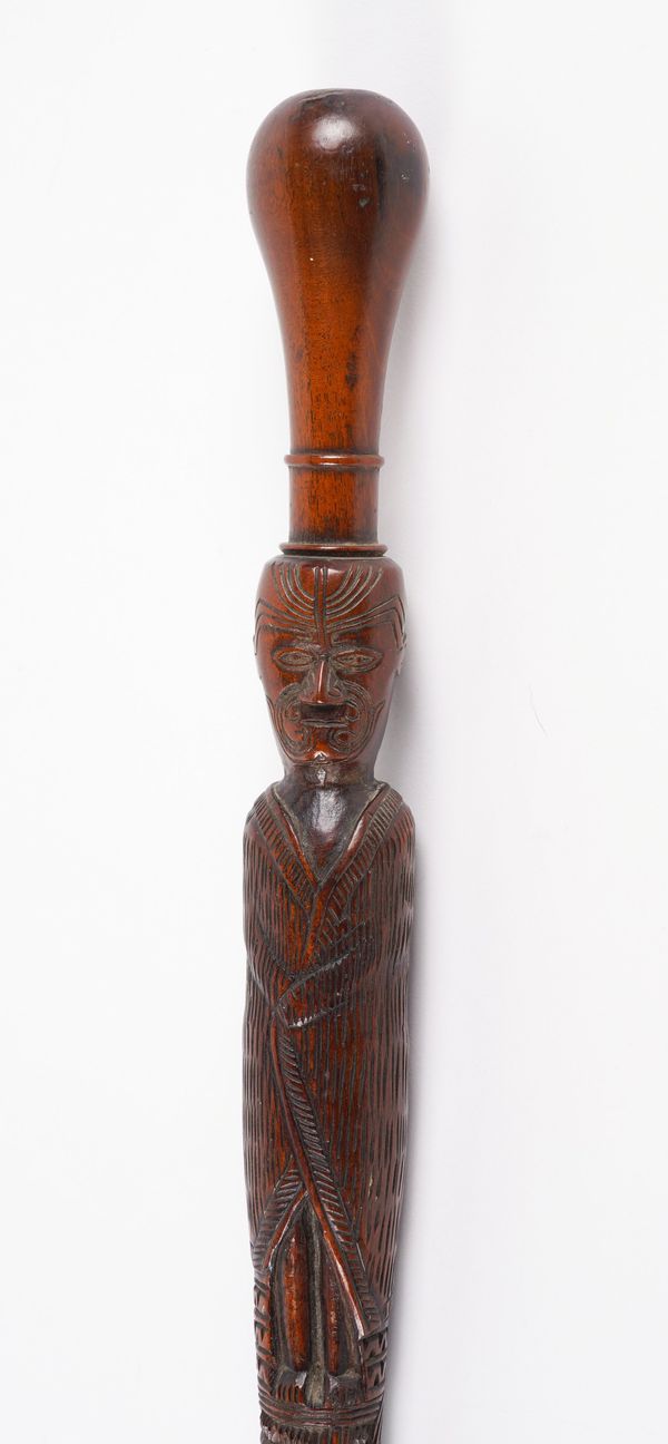 AN INTERESTING MAORI CARVED WALKING CANE OR CEREMONIAL GREETING STICK