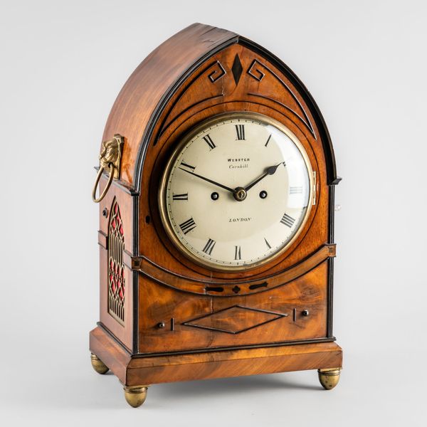 A REGENCY MAHOGANY LANCET BRACKET CLOCK