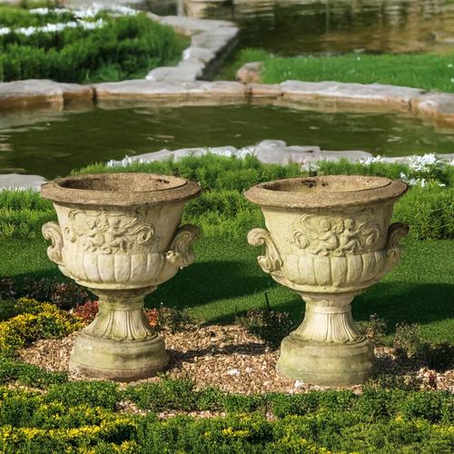 A PAIR OF RECONSTITUTED STONE JARDINIÈRES (2)
