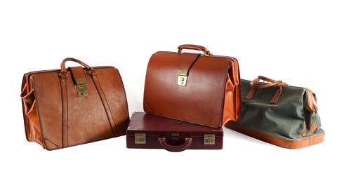 SWAINE & ADENEY, TANNER KROLLE & CARTIER: THREE LEATHER BRIEF CASES AND A HOLD-ALL (4)