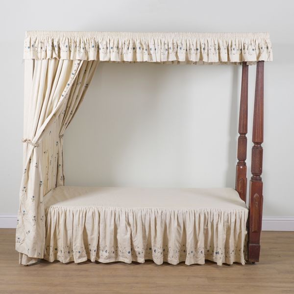 A MAHOGANY AND UPHOLSTERED FOUR POSTER SINGLE BED