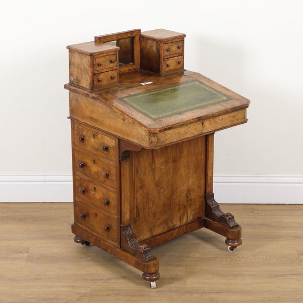 A VICTORIAN WALNUT DAVENPORT