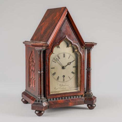 AN EARLY VICTORIAN GOTHIC REVIVAL MAHOGANY SMALL TIMEPIECE