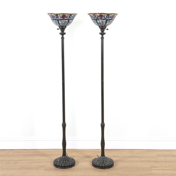 A PAIR OF AMERICAN FLOOR STANDING LAMPS WITH COLOURED LEADED GLASS SHADES (2)