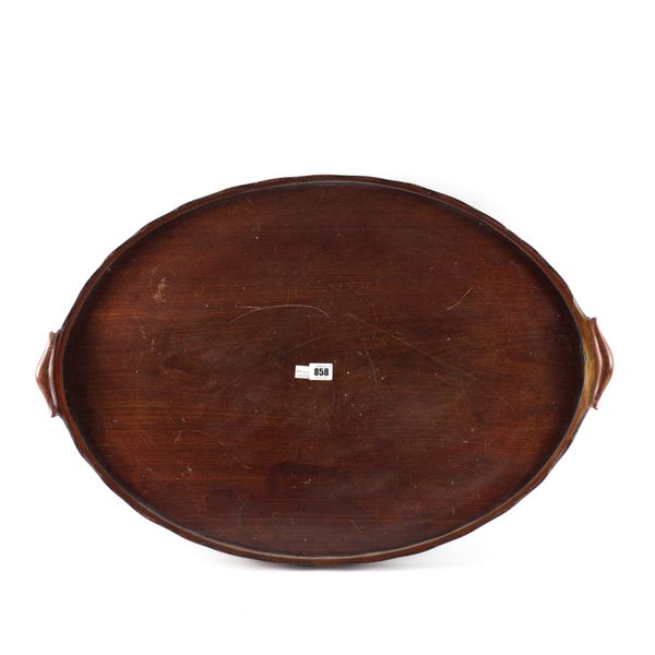 A LARGE GEORGE III MAHOGANY OVAL SERVING TRAY