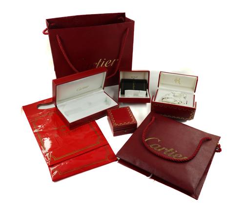A GROUP OF CARTIER CASES AND PACKAGING