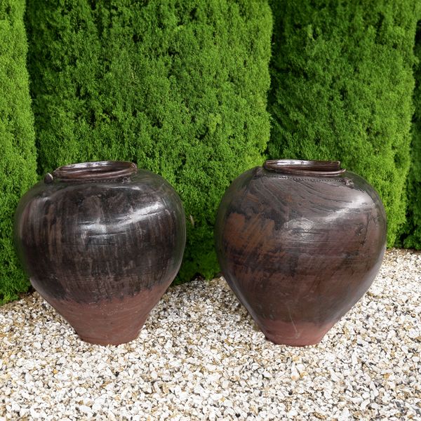 A PAIR OF LARGE BROWN GLAZED TERRACOTTA GARDEN POTS (2)