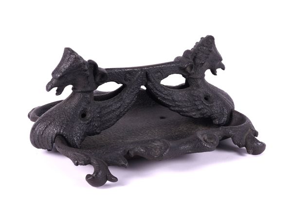 A LATE VICTORIAN CAST-IRON GRIFFIN BOOT SCRAPER