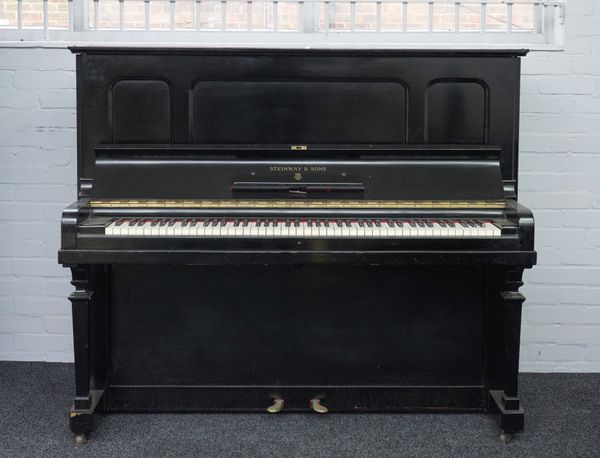 STEINWAY & SONS; AN EBONISED IRON FRAMED OVERSTRUNG UPRIGHT PIANO