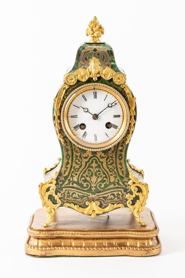 A FRENCH GILT-METAL MOUNTED GREEN-STAINED TORTOISESHELL MANTEL CLOCK