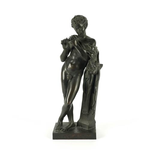 OF GRAND TOUR INTEREST: A FRENCH PATINATED BRONZE OF A SATYR OF FAUN PLAYING THE FLUTE AFTER THE ANTIQUE