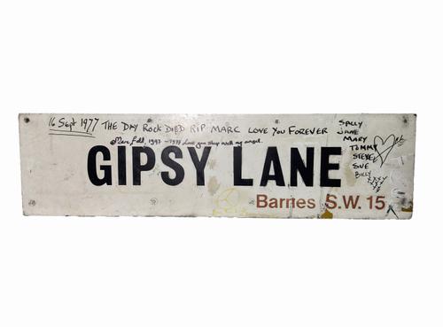 ORIGINAL STREET SIGN OF GIPSY LANE, BARNES S.W.15 WHERE THE MINI DRIVEN BY GLORIA JONES AND MARC BOLAN STRUCK A TREE KILLING THE LEAD SINGER OF T. REX, WITH VARIOUS HANDWRITTEN ANNOTATIONS