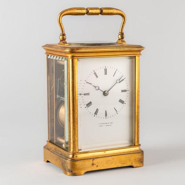 A FRENCH BRASS STRIKING CARRIAGE CLOCK