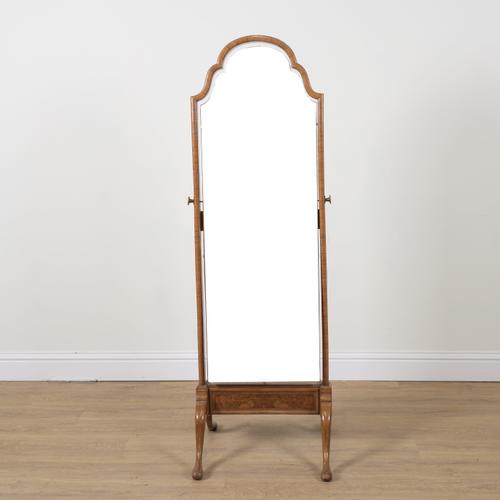 A QUEEN ANNE STYLE WALNUT FRAMED ARCH TOPPED CHEVAL MIRROR