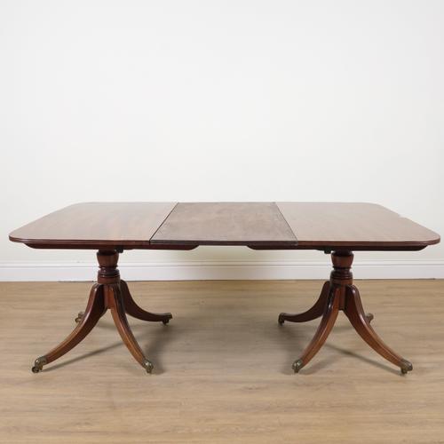 A TWIN PEDESTAL MAHOGANY EXTENDING D-END DINING TABLE