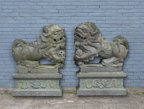 A PAIR OF LARGE GRANITE OPPOSING CHINESE DOGS OF PHO STATUES (2)